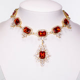 Set din Aliaj Placat cu Aur ( 28 grame ) cu Cristal Roșu Emporia® și Cristal Alb Emporia® ( Colier+Cercei )