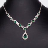 Set din Aliaj Placat cu Aur ( 30 grame ) cu Cristal Verde Emporia® și Cristal Alb Emporia® ( Colier+Cercei+Brățară+Inel )