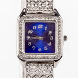 Ceas din Aliaj Placat cu Aur ( 57 grame ) cu Cristal Albastru Emporia® și Cristal Alb Emporia® 12 Carate ( Colier+Cercei+Pandantiv )