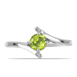 Inel din Argint 925 ( 2.11 grame ) cu Peridot Changbai și Topaz Alb 0.56 Carate