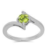 Inel din Argint 925 ( 2.11 grame ) cu Peridot Changbai și Topaz Alb 0.56 Carate