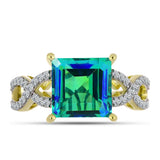 Inel din Argint 925 Placat cu Aur ( 2.83 grame ) cu Cuarț Păun și Topaz Alb 3.8 Carate